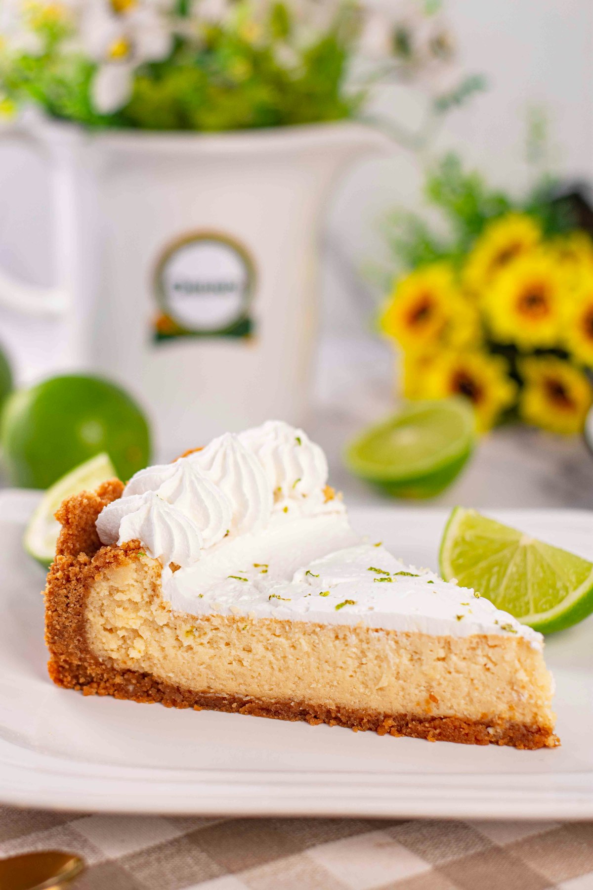 Slice of key lime pie with whipped cream