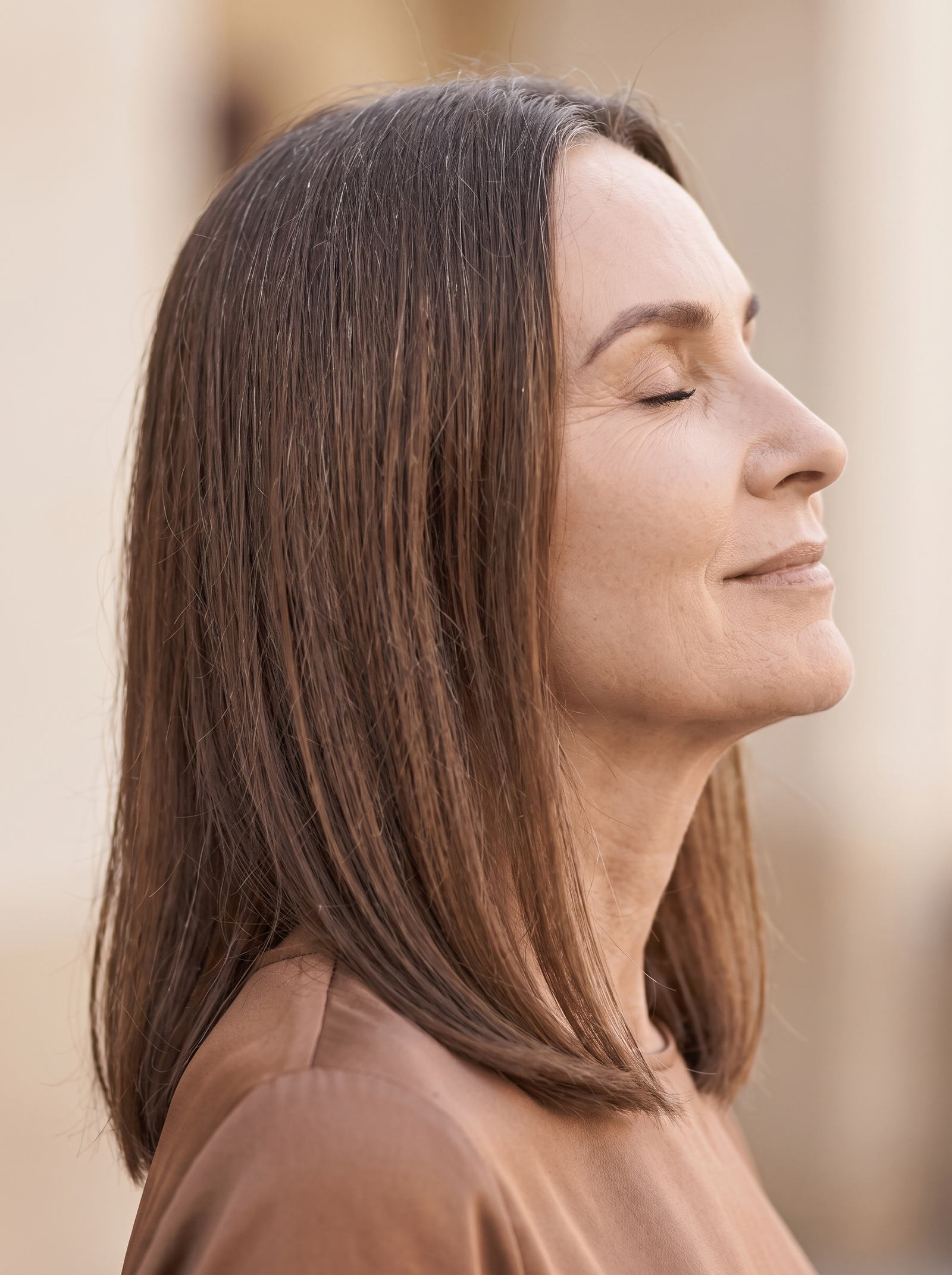 Woman smiling at her phone