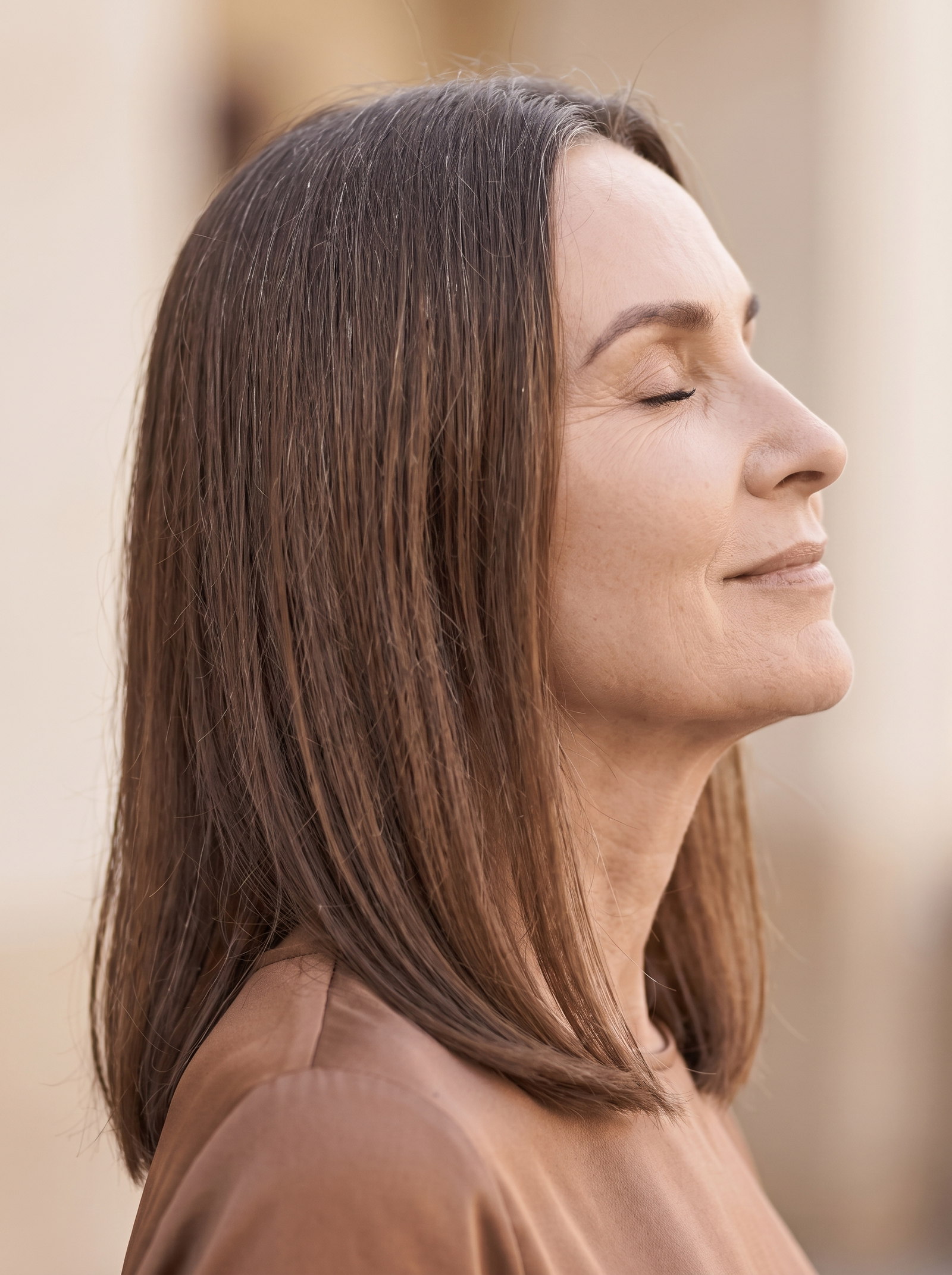 Woman smiling at her phone