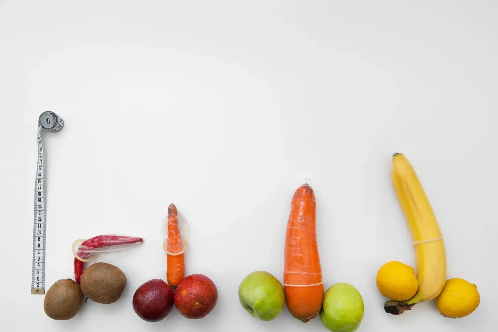Fruits and vegetables with measuring tape