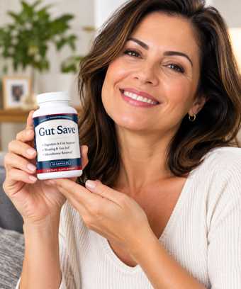 Woman smiling and holding a bottle of Gut Save