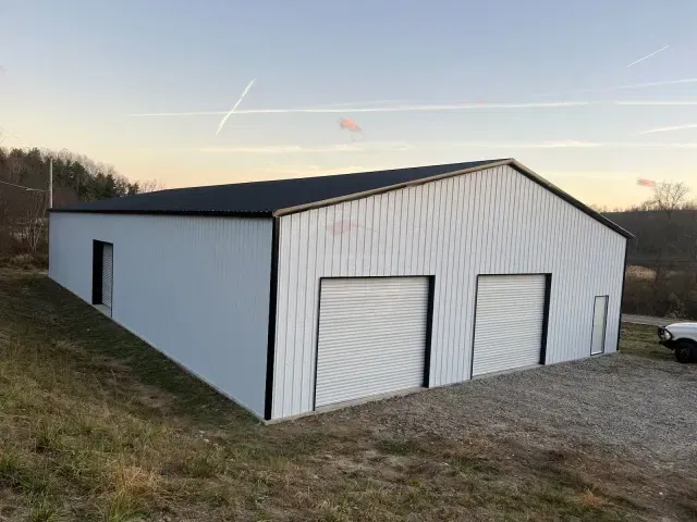 Clear span steel building with roll-up doors
