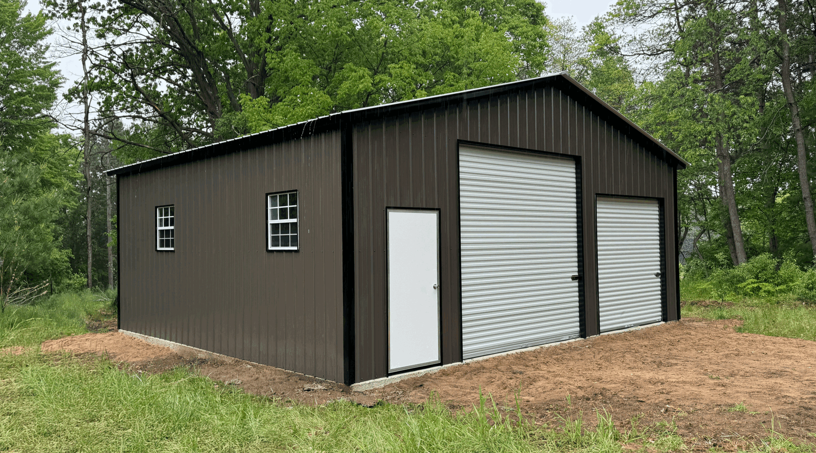 Metal garage with lean-to sold by Pinnacle Metal Buildings